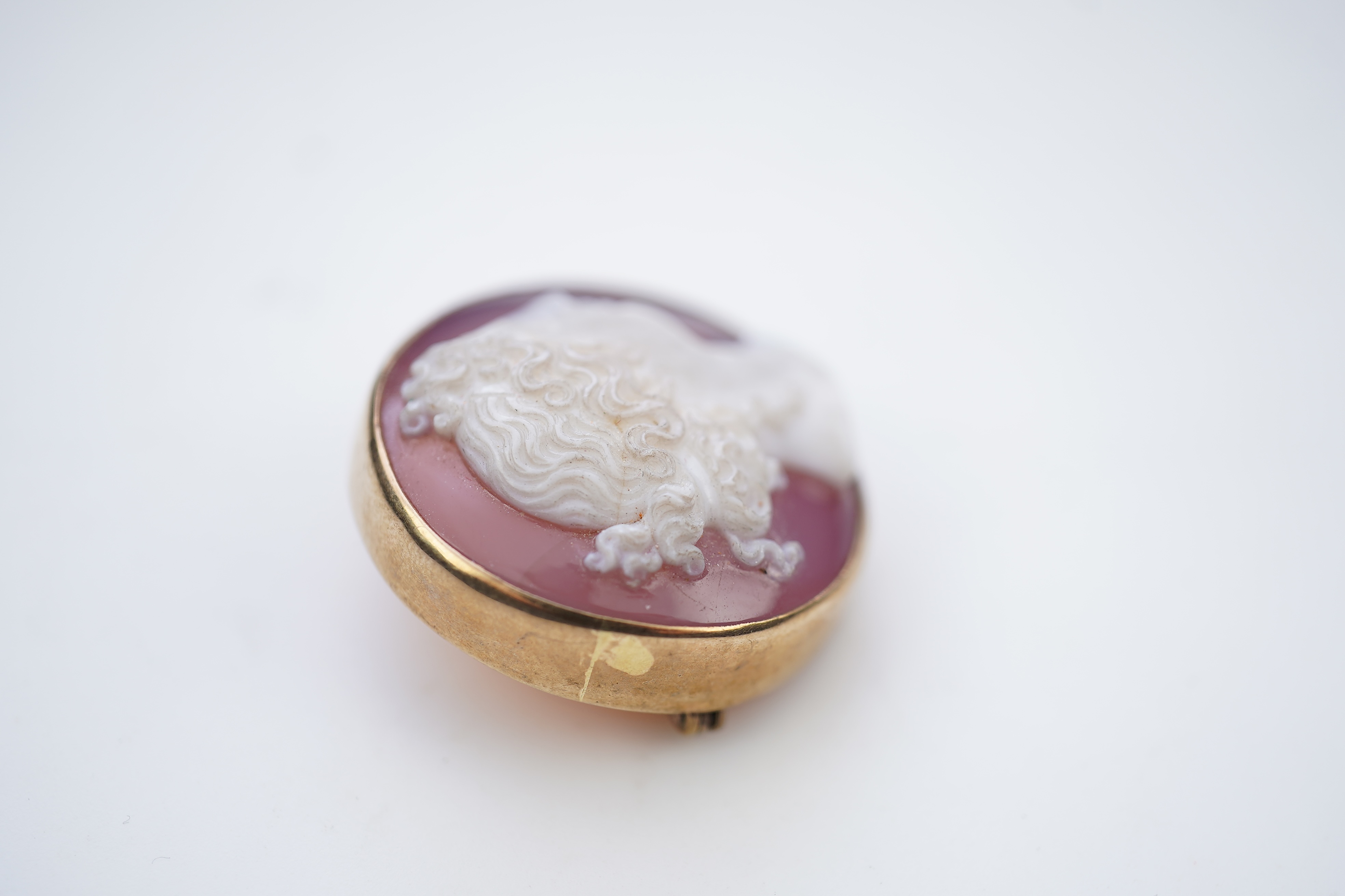 A Victorian onyx cameo brooch, late 19th century